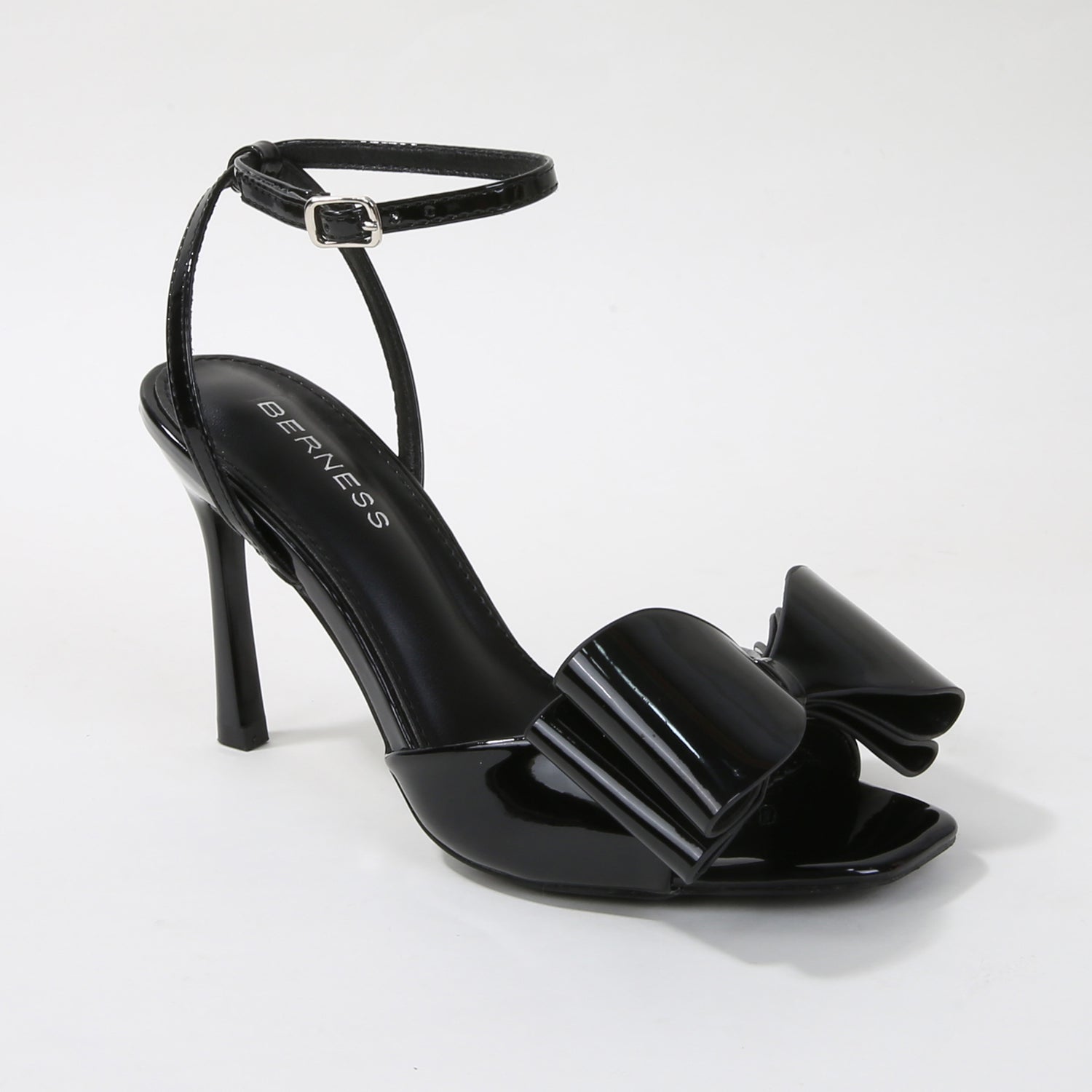 Cleva Statement Bow Heeled Sandals