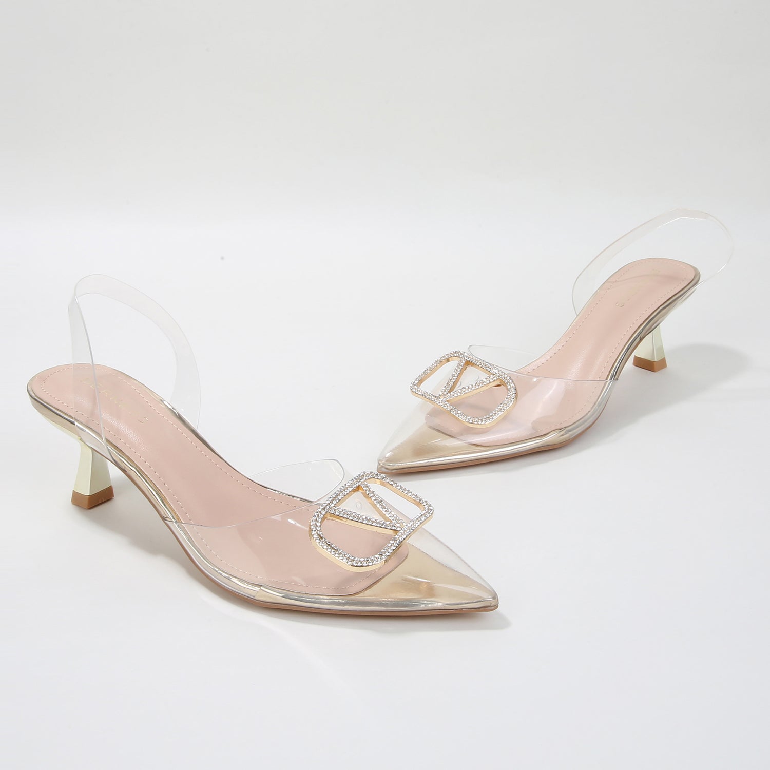 Nimona Rhinestone Emblem Clear Slingback Heels